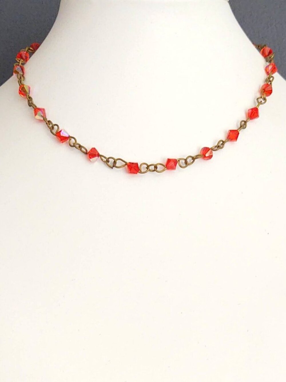 Delicate orange crystal necklace with AB coating